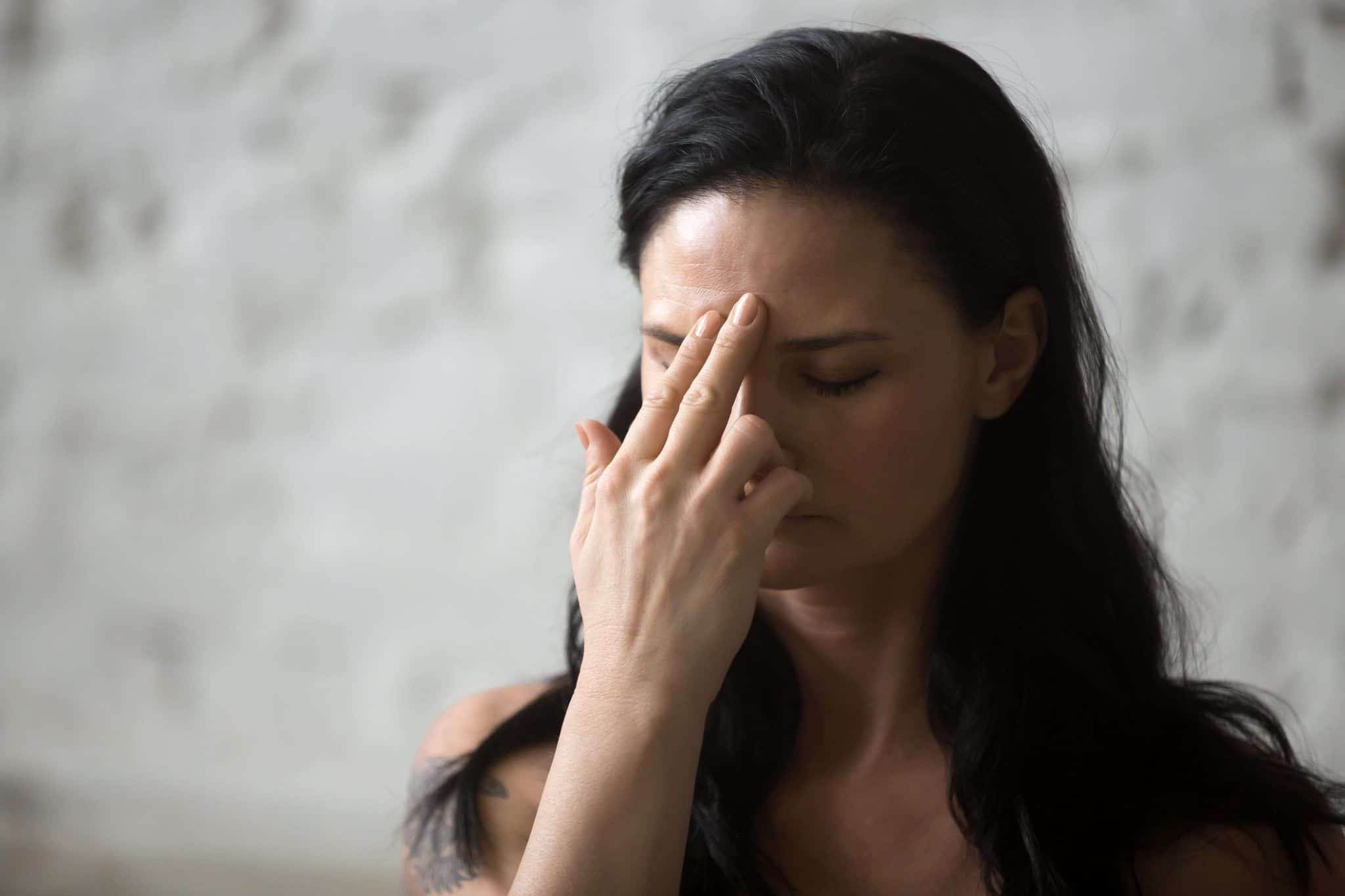 Lady Performing Alternative Nostril Breathing.